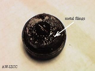 dirty drain plug with metal filings